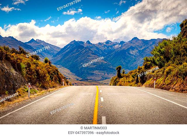 Scenic road through mountain landscape near Lake Hawea, South island of New Zealand