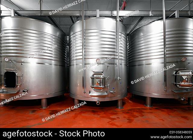 Industrial stainless steel vats in modern brewery. High quality photo
