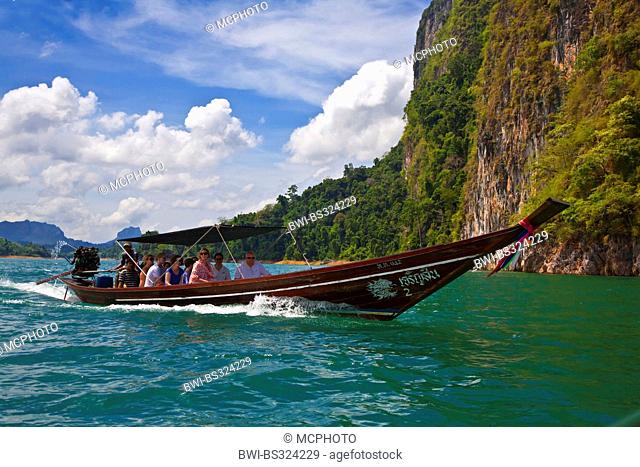 long-tail boat on Chiew Lan Lake created by the Ratchaprapa dam, Thailand, Sura Thani, Khao Sok National Park