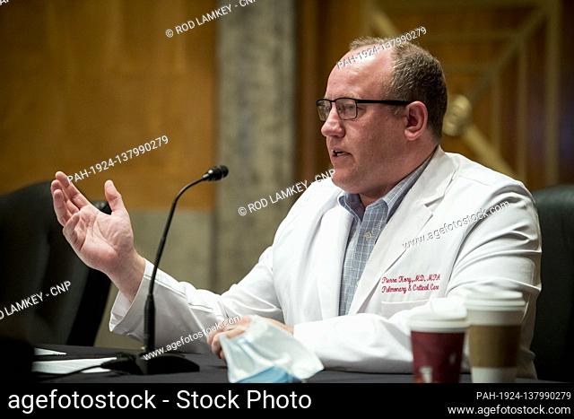 Pierre Kory, M.D., Associate Professor of Medicine St. Luke's Aurora Medical Center, offers his opening remarks during a Senate Committee on Homeland Security...