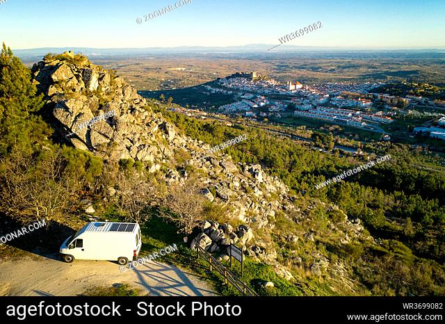 Castelo de Vide drone aerial view in Alentejo, Portugal from Serra de Sao Mamede mountains and a camper van