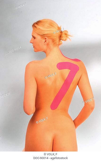 back view of a woman doing Medi-Taping