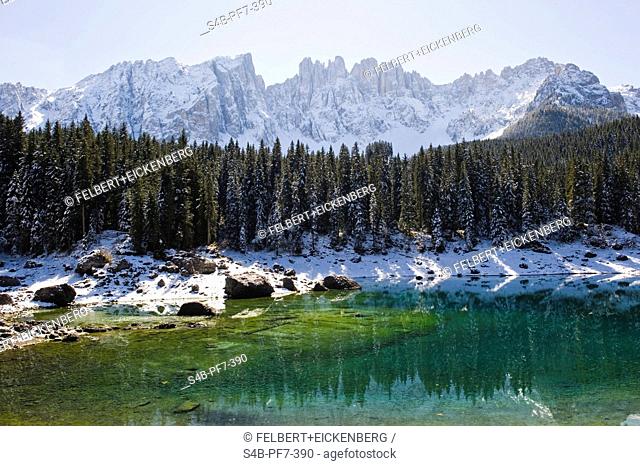 Snow-covered scenery at Lago di Carezza, Trentino-Alto Adige.Suedtirol, Italy