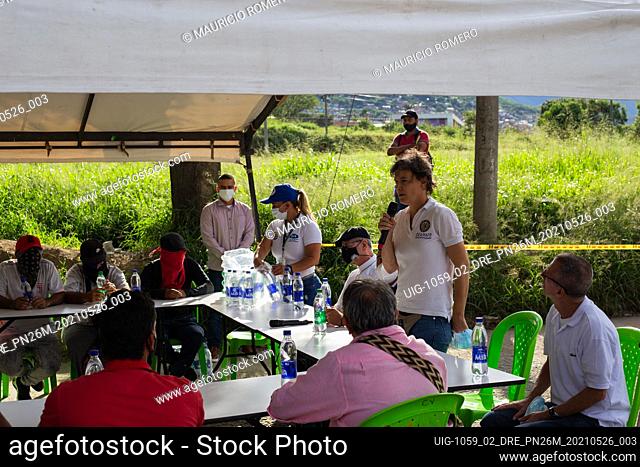 A member of the OAS (OEA) talks as Mayor of Yumbo, Valle del Cauca, John Jairo Santamaria gathers in a meeting with OAS Organization of American States (OEA)