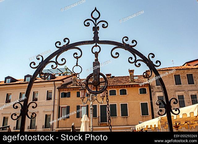 Detail of San Vito square in Treviso in Italy under a blue sky