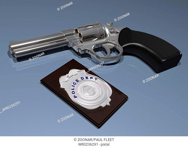 Police badge and gun