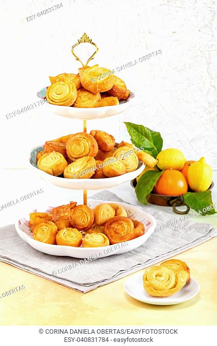 Spirals of fried pastry flavored with orange, typical Italian sweets made during the carnival period