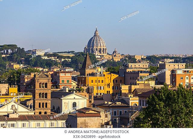 Saint Peter's Basilica dome and the roman rooftops, Rome, Italy