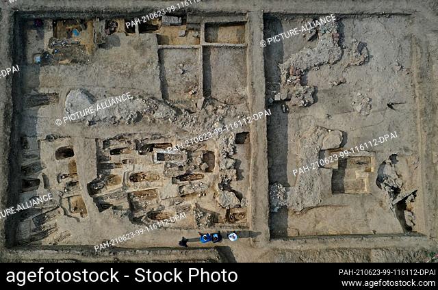 23 June 2021, Saxony-Anhalt, Eisleben: An excavation site can be seen on the hill ""Kleiner Klaus"" above Helfta. The rediscovered royal palace of Helfta...