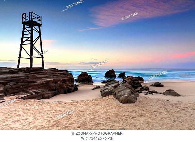 Shark Watch Tower and jagged rocks Australia