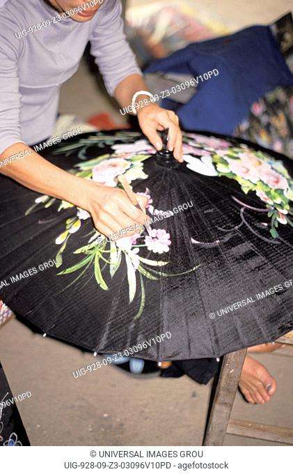 Thailand. Chiang Mai Region. Artisan At An Umbrella Factory