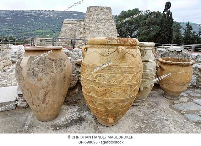 Large clay vessels used for storing food and oil in the Palace of Knossos, Crete, Greece, Europe