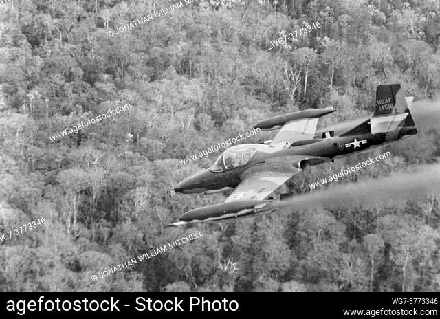 VIETNAM -- 1960s -- Cessna A-37A firing rockets while in flight in Vietnam. US Air Force photo (Released) -- Picture by Lightroom Photos / USAF