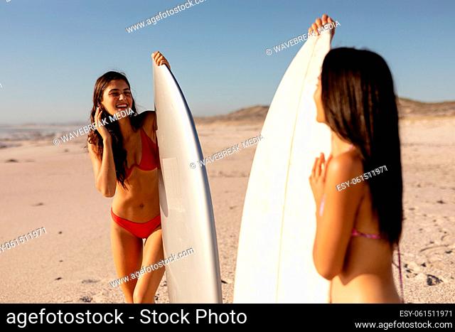 Caucasian women having fun on the beach