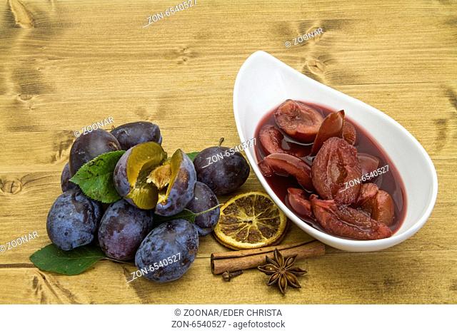 plums in red wine