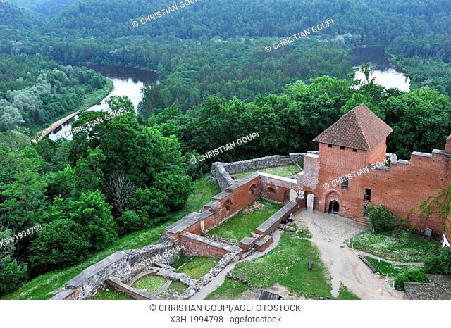 Medieval brick castle overhanging the Gauja River, Turaida Museum Reserve, Sigulda, Gauja National Park, Vidzeme Region, Latvia, Baltic region, Northern Europe