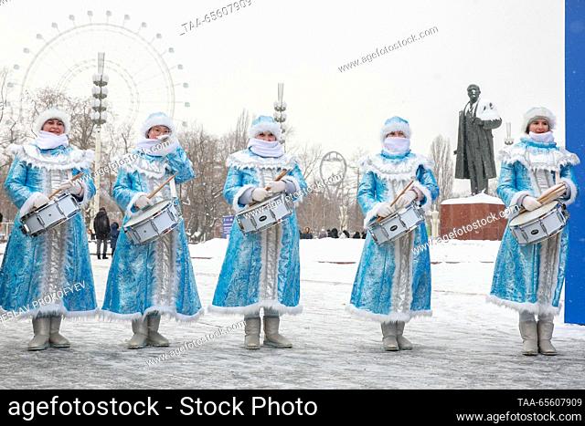 RUSSIA, MOSCOW - DECEMBER 10, 2023: Women dressed as Snow Maidens perform at a cerebration of birthdays of Sook Irei, the Tuvan Father Frost, and Kodzyd Pol