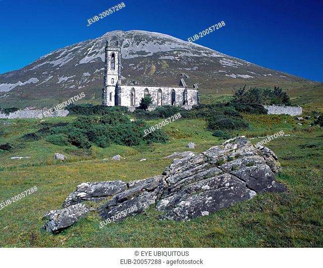 Ruined church in The Poisened Glen with Errigal peak of the Derryveagh Mountain Range behind