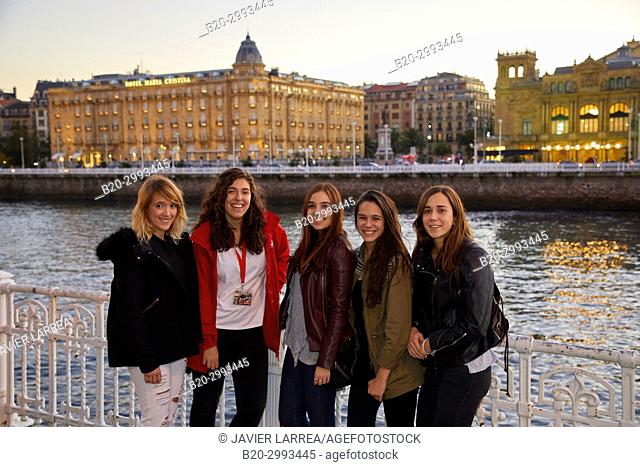 Group of tourists and guide making a tour of the city, Maria Cristina Hotel, Victoria Eugenia Theatre, Urumea river, Donostia, San Sebastian, Gipuzkoa
