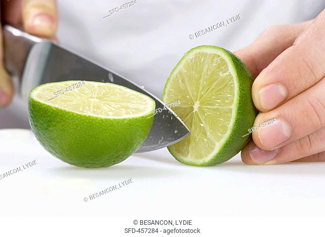 A lime being halved