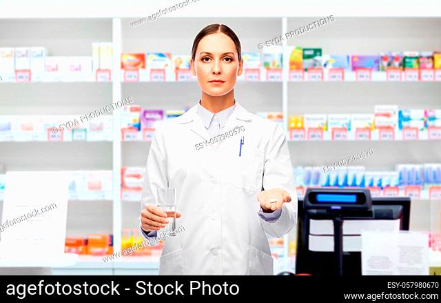 doctor with medicine and water at pharmacy