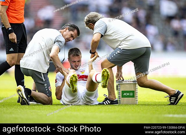 23 July 2022, Baden-Wuerttemberg, Stuttgart: Soccer: Test matches, VfB Stuttgart - FC Valencia at Mercedes-Benz Arena. Stuttgart's Sasa Kalajdzic sits injured...