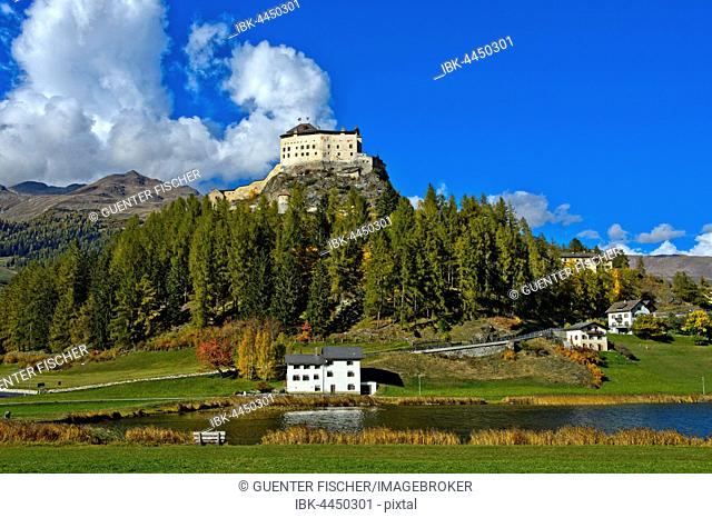 Tarasp Castle above the Lai da Tarasp, Scuol, Lower Engadine, Grisons, Switzerland