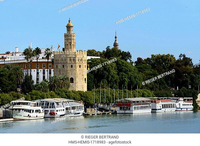 Spain, Andalusia, Seville, Guadalquivir river Banks, the Golden Tower (Torre del Oro), former military watch tower built at the beginnings of the 13th century...