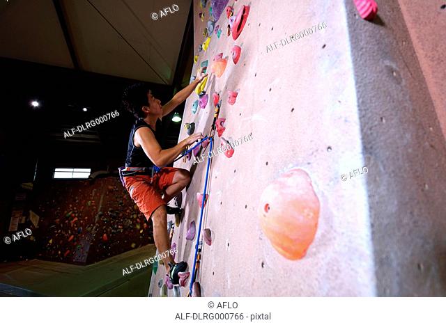 Japanese climbing athlete in action