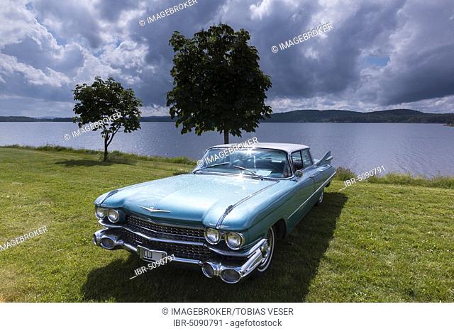 American vintage car, Cadillac Sedan de Ville, built 1959, behind the lake Glafsfjorden, Arvika, Värmland, Sweden, Europe