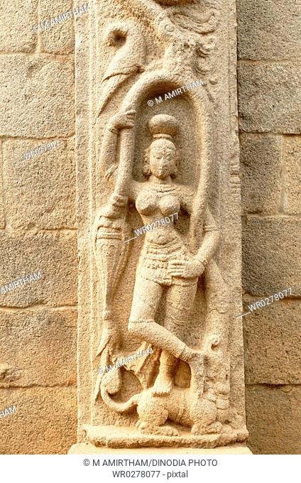 Lady statue on pillar in Rayar gopuram in Mahabalipuram , Tamil Nadu , India