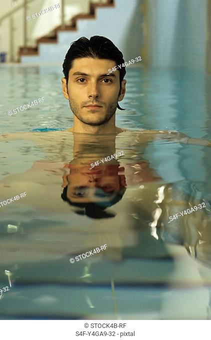 Darkhaired Man in a Swimming-Pool - Sports - Leisure Time