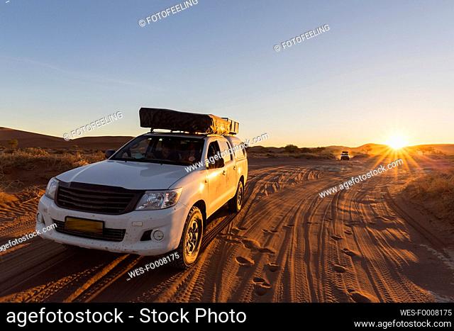 Namibia, Namib Desert, Namib Naukluft National Park, off-road vehicle with roof tent