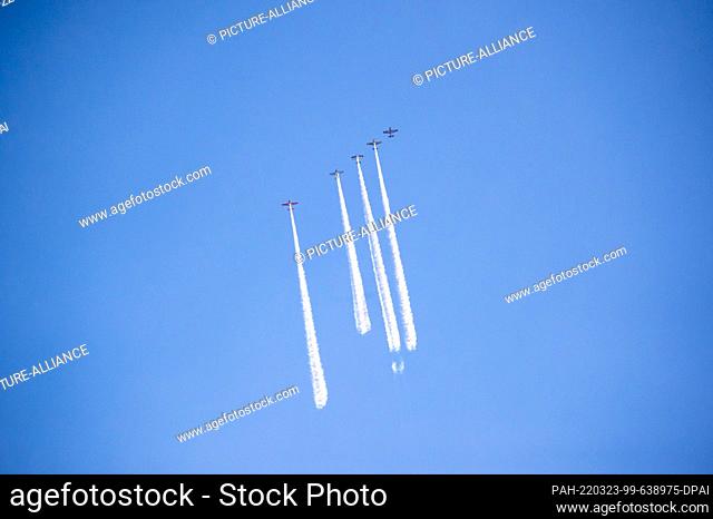 01 March 2021, Hamburg: Airplanes write an advertising message in the sky above Hamburg. As part of an advertising campaign for a streaming service