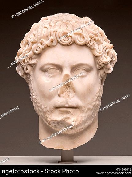 Author: Ancient Roman. Portrait Head of Emperor Hadrian - AD 130 - 138 - Roman. Marble. 130 AD - 200 AD. Italy