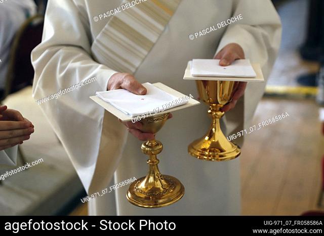 Catholic mass. Eucharist table with the liturgical items. France