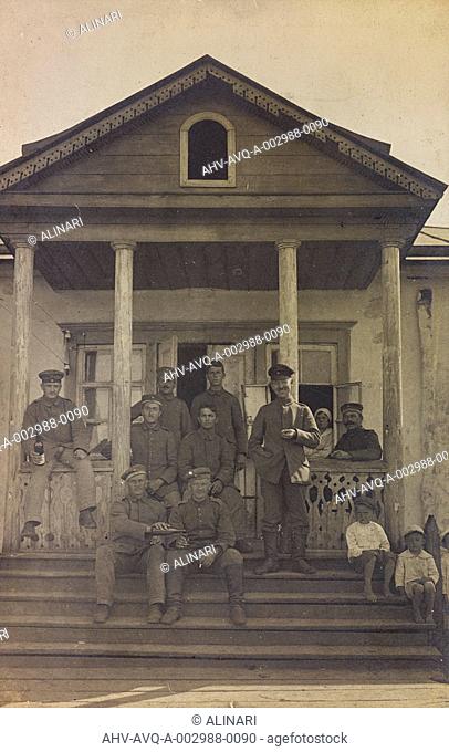 First World War: the 'Ukraine in the years 1914-1916 during the invasion of the German army. Group of soldiers on the front steps of a house
