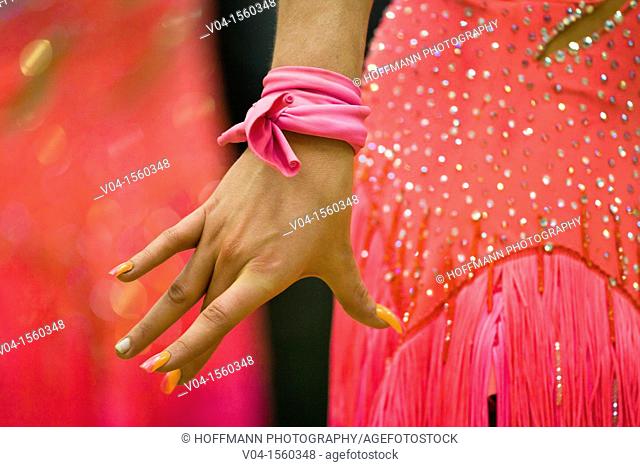 Close up of a dress and a female hand at a dancing competition, Germany, Europe