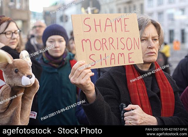 10 January 2020, Berlin: A banner with the words ""Shame Morrison Shame"" can be seen in front of the Australian Embassy at a rally with the slogan ""Stop Adani...