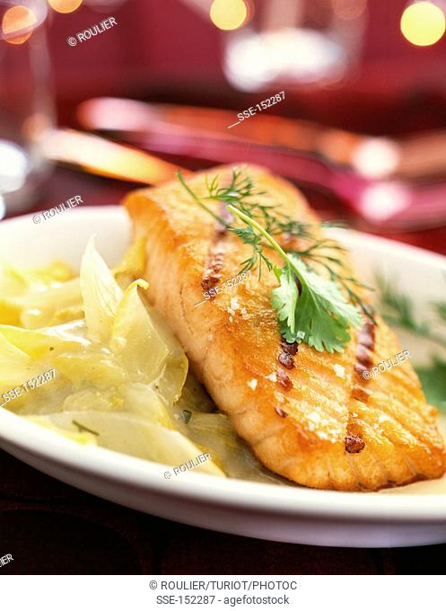 Grilled piece of salmon with chicory