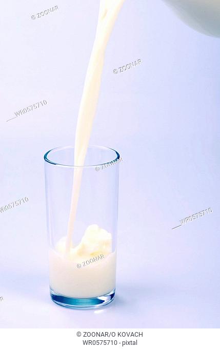 Milk pouring into the glass