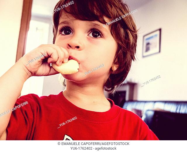 Child eats bread