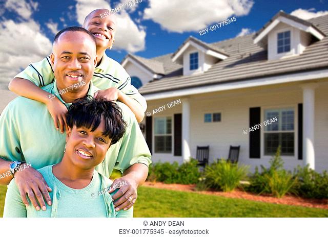 Attractive African American Family in Front of Home