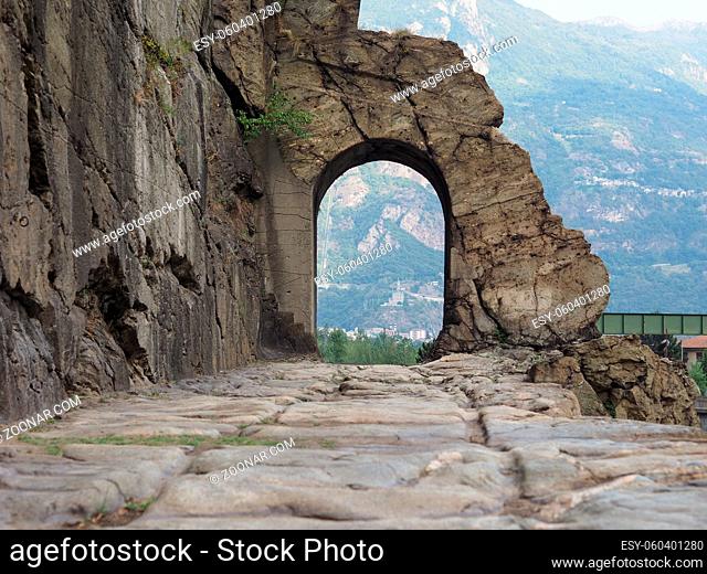 Ancient roman consular road stone arch in Donnas, Italy