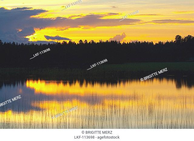 After-glow at a lake near Arjeplog, Lapland, northern Sweden