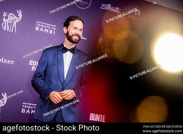 05 October 2022, Berlin: Franz Dinda, actor, comes to the ""Tribute to Bambi"" charity event. The aim of the Hubert Burda Media event is to draw attention to...