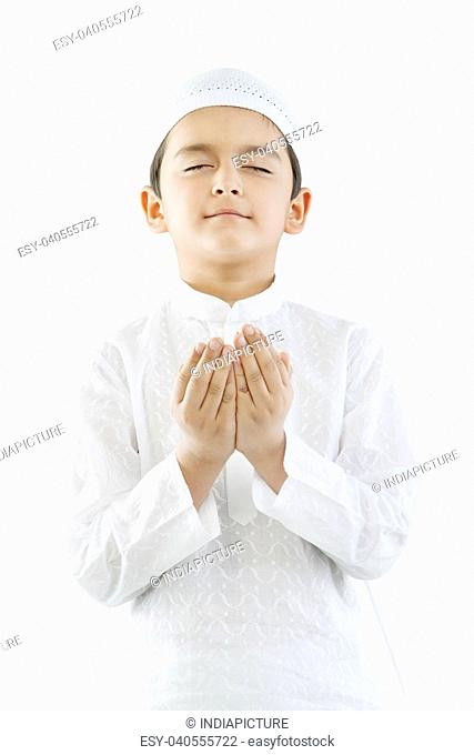 Muslim boy praying, Stock Photo, Picture And Low Budget Royalty Free Image.  Pic. ESY-040555723 | agefotostock