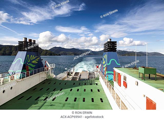 Looking past the stern of the interislander ferry at the Queen Charlotte Sound near Picton, New Zealand