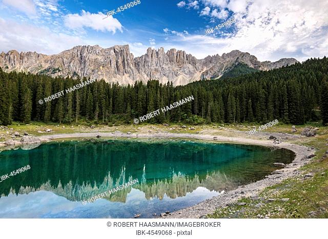 Karersee, Lago di Carezza, in front of Latemar Mountains, Dolomites, South Tyrol, Italy