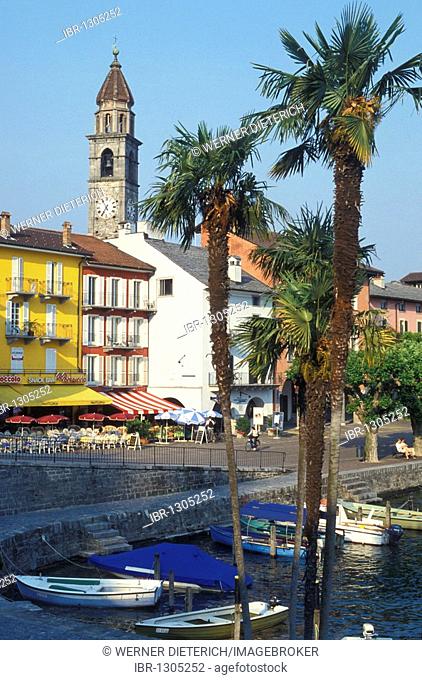 View of the waterfront of Ascona, boardwalk, cafes, restaurants, fishing port, fishing boats, Lake Maggiore, Ticino, Switzerland, Europe